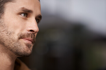 Outdoor, thinking and face of man with serious expression, confidence and adult pensive and...