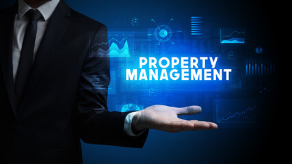 Hand of Businessman holding motivational message