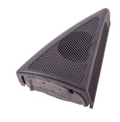 speaker of an acoustic system - an audio for playing music in a car interior on a white isolated background in a photo studio. Spare parts for auto repair in a workshop or for sale for tuning