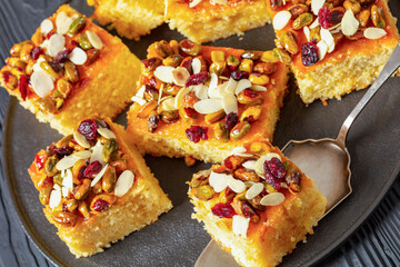 slices of yogurt cake with nuts and dried berries