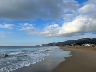 Fototapeta na wymiar The Mediterranean Sea beach in the morning near Castelldefels, Catalonia, Spain, January 2023