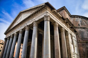 Roman Pantheon at daylight with vibrant blue sky. Rome, Italy