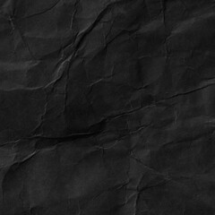 Black paper texture, a sheet of black wrinkled paper