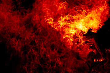Fire embers particles over a black background. Fire sparks.