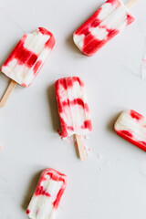 Organic ice cream Popsicle with strawberries and yoghurt