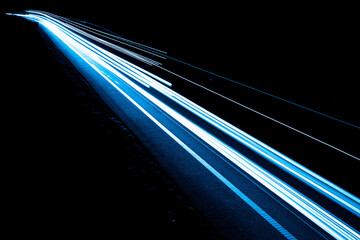 blue car lights at night. long exposure