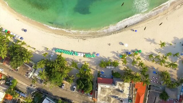 Overhead drone shot showing some raptors flying above the Miami Beachfront, located in Central Greece nestled between the Mediterranean and Ionian Sea.