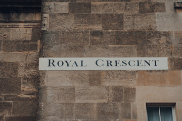 Street name sign on Royal Crescent in Bath, Somerset, UK.