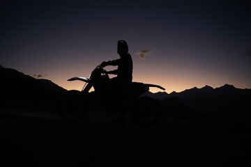 person sitting in the motocross bike