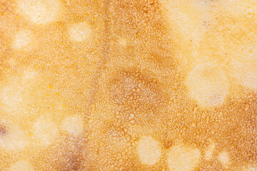 Crepe / pancake texture.