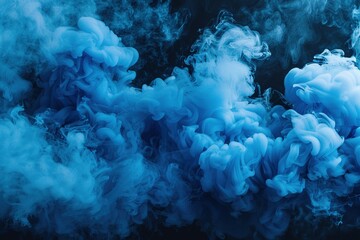 A thick cloud of blue smoke drifting across a black back