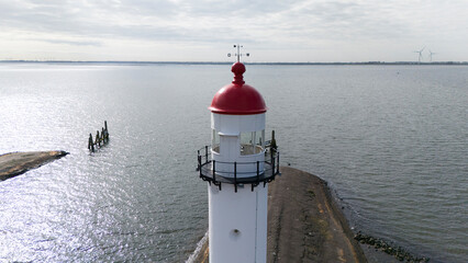 High sea water level at the lighthouse from hellevoetlsuis drone photo - 762247372