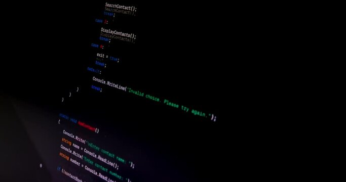hacker scrolls program code on notebook computer, cyber security concept