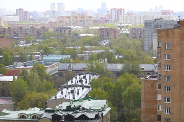 Spring in Moscow, city landscape from window of multi-storey building