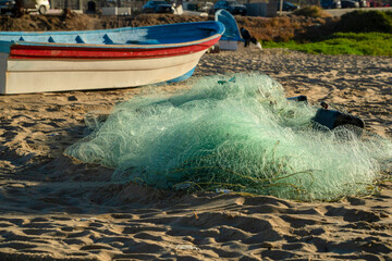 fishing net in punta lobos beach, baja california sur mexico