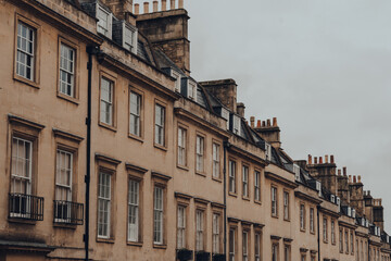 Fototapeta na wymiar Terraced houses on a street in Bath, Somerset, UK.