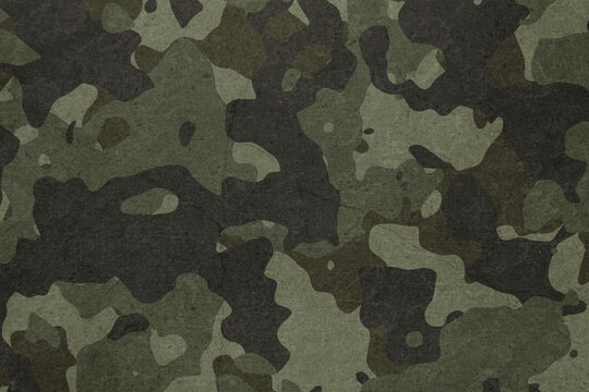Texture of military dirty camouflage fabric. Combat protective camouflage for background