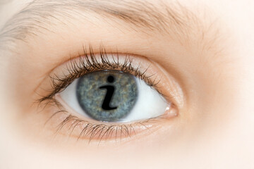 Collage with right blue eye of child with with i (information) sign, close up