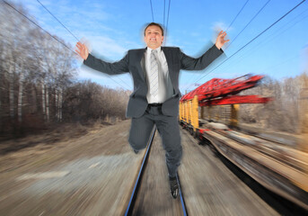 collage with businessman in black suit running away from train on background of railroad tracks, motion blur