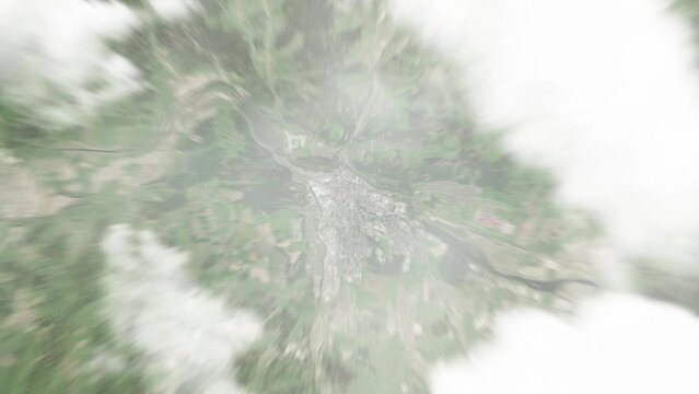 Earth zoom in from space to Zilina, Slovakia. Followed by zoom out through clouds and atmosphere into space. Satellite view. Travel intro. Images from NASA