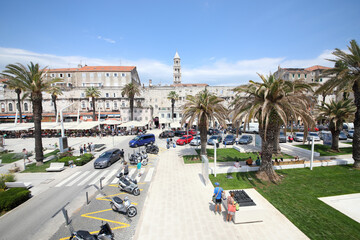 Embankment Riva decorated with palm trees and flower beds. This is popular place for walking in the...