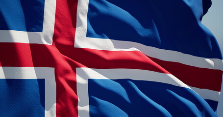 Close-up of the national flag of Iceland flutters in the wind on a sunny day