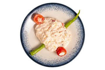Olive oil and spicy appetizer. Appetizer dishes. Atomic dish with spicy yoghurt isolated on white background. local name atom mezesi. Top view