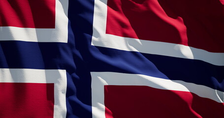 Close-up of the national flag of kingdom Norway flutters in the wind on a sunny day