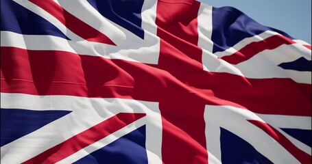 United Kingdom waving flag. UK British National closeup. Empire Banner Flaping in Wind