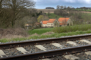 Fototapeta na wymiar Historic railway and landscape at Simpelveld Zuid Limburg Netherlands. Miljoenenlijn. Millions Line. Rails. Hills.