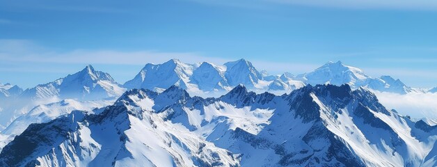 Fototapeta na wymiar Panoramic View of Snow-Capped Mountain Peaks