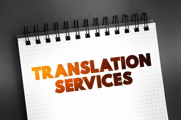 Translation Services text on notepad, business concept background