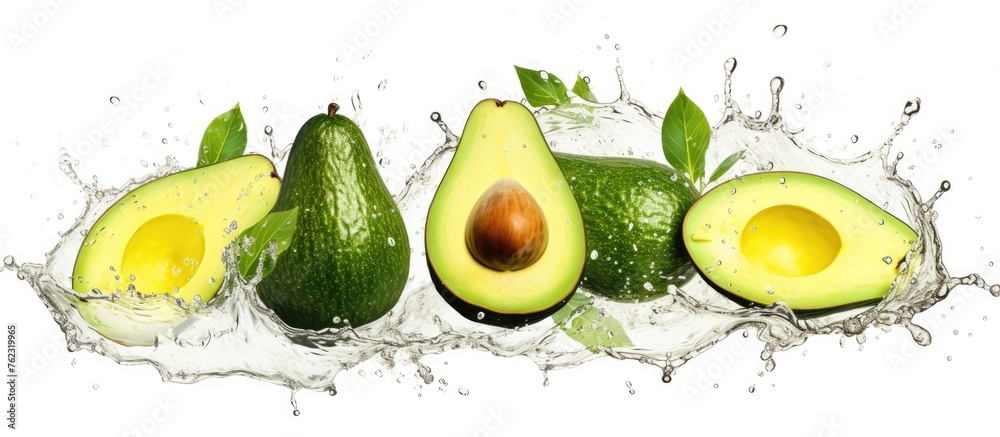 Sticker four ripe avocados are depicted splashing in water on a clean white background. this image showcases