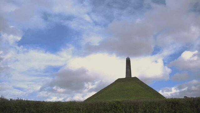 One of the highest points of the Utrecht Hill Ridge, Woudenberg. View of the Pyramide van Austerlitz in Zeist, Netherlands on a cloudy day of spring 4k
