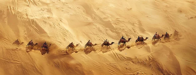 Foto auf Alu-Dibond a caravan's passage through a vast expanse of sand, with camels and travelers weaving in a graceful, snaking line. © lililia