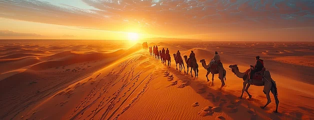Foto op Aluminium a caravan's passage through a vast expanse of sand, with camels and travelers weaving in a graceful, snaking line. © lililia