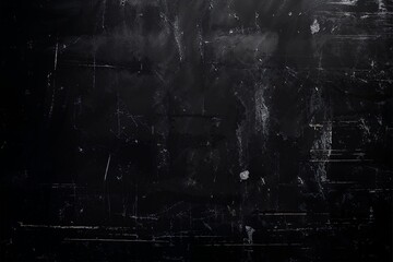 An old black grunge background, reminiscent of aged textures and weathered surfaces, with scratched and peeling paint over time. Dark textured wallpaper will lend a vintage style to the project.
