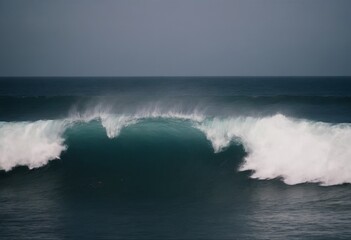 Fototapeta premium Big breaking Ocean wave on a sandy beach on the north shore of Oahu Hawaii