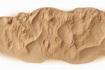 Detailed close-up of sand on a white surface, suitable for backgrounds or textures