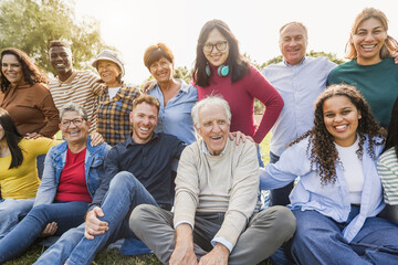Group of multigenerational people smiling in front of camera - Multiracial friends of different...