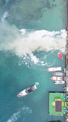 Aerial top view boat be on fire at sea. hq photo - 762349581
