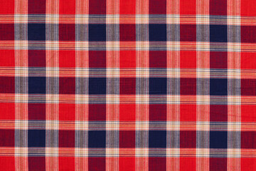 Traditional red and blue tartan plaid fabric pattern