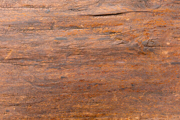 Red brown wood closeup texture background.