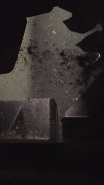 Dive into the world of woodworking with this vertical 4K slow-motion clip, capturing the dangers of a circular saw in action.