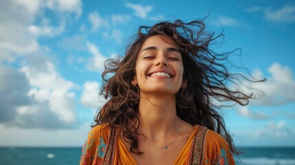 Happy indian woman, outdoor freedom and arms out, ocean wind and breathe fresh air with purpose or happiness, motivation and wellness, peace and hope. Smile, optimism and dream, success in nature