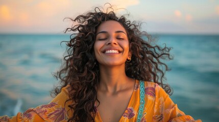 Happy indian woman, outdoor freedom and arms out, ocean wind and breathe fresh air with purpose or happiness, motivation and wellness, peace and hope. Smile, optimism and dream, success in nature - obrazy, fototapety, plakaty