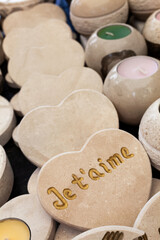 Carved Stone Hearts for Sale in a Market - 762367141