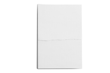 Notepad with torn sheet on empty background