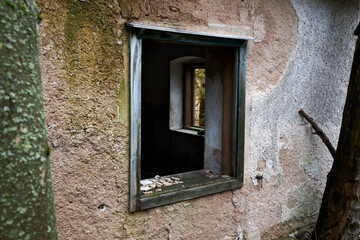 broken window in abandoned house