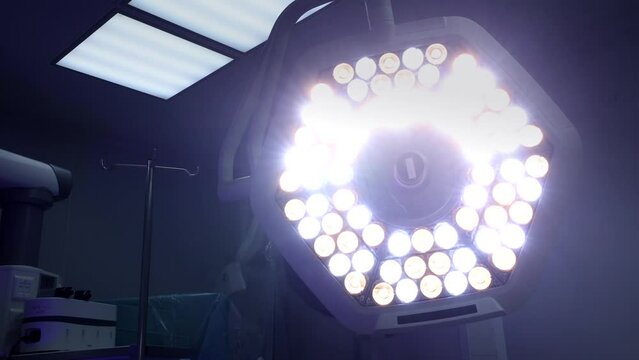 Surgical operating. 4K close up video with the bright lights used for better view for pacient during operation. Hospital video.